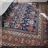 DR09. Handknotted wool Persian rug. Measures approx. 9' x 12' 